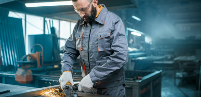 Image - Metal industry worker at factory in work wear